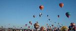 Smokey Bear lifts off from Balloon Fiesta Park to follow the other balloons already in flight.